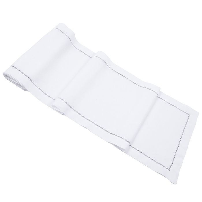 White linen table runner with navy blue hemstitch trim