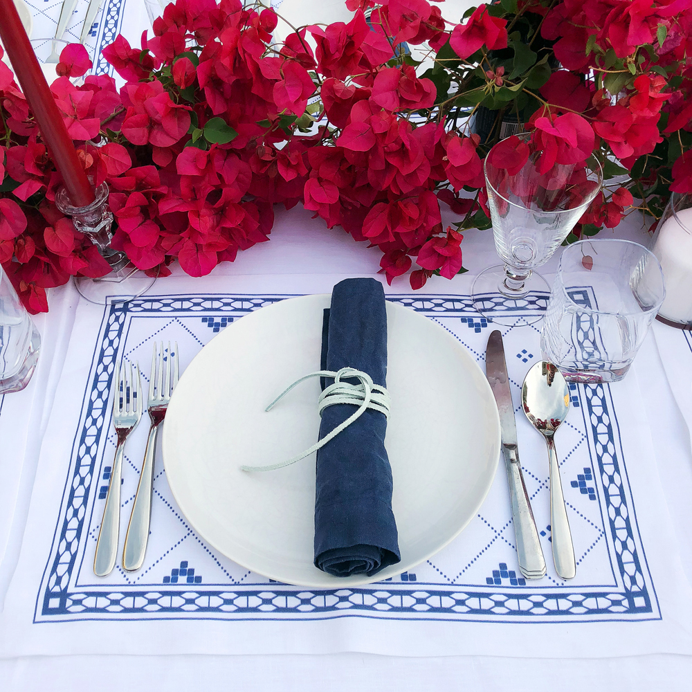 Blue and white greek dinner party bougainvillea runner outdoor entertaining summer vacation