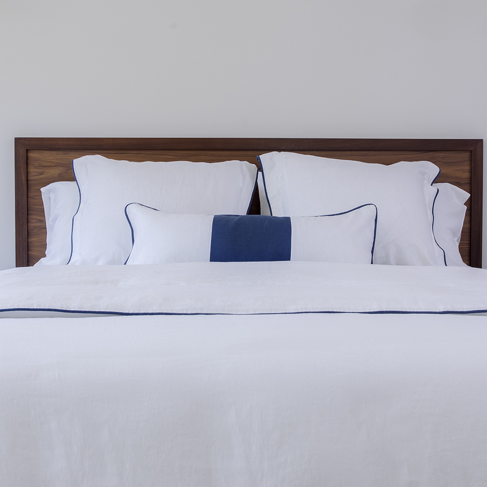 white Italian linen with navy blue piping classic bedding duvet sheets guest room