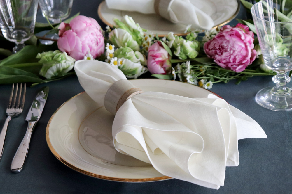 Teal linen placemat and ivory linen napkin