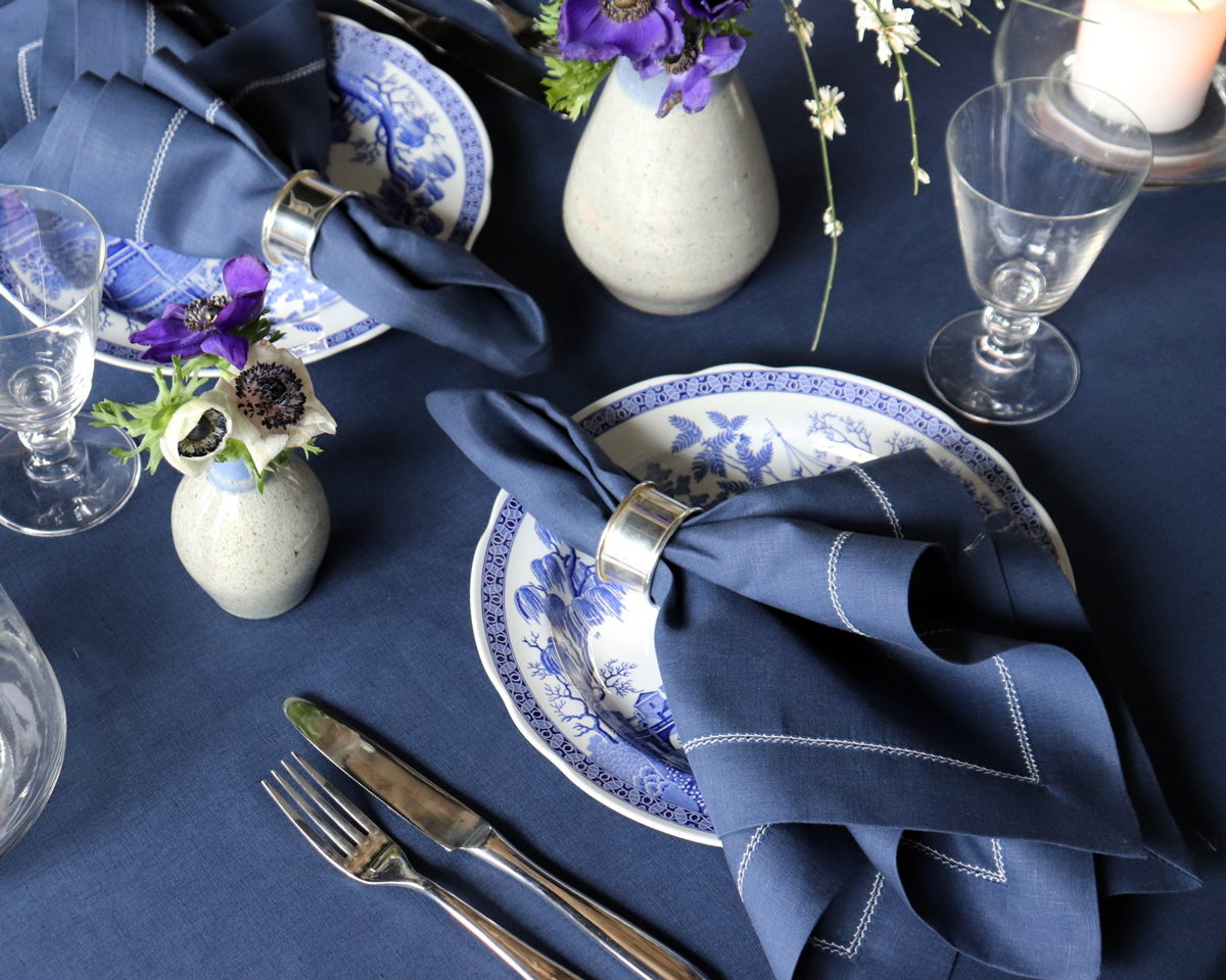 Navy blue and white tablesetting hemstitched linen napkins tablecloth