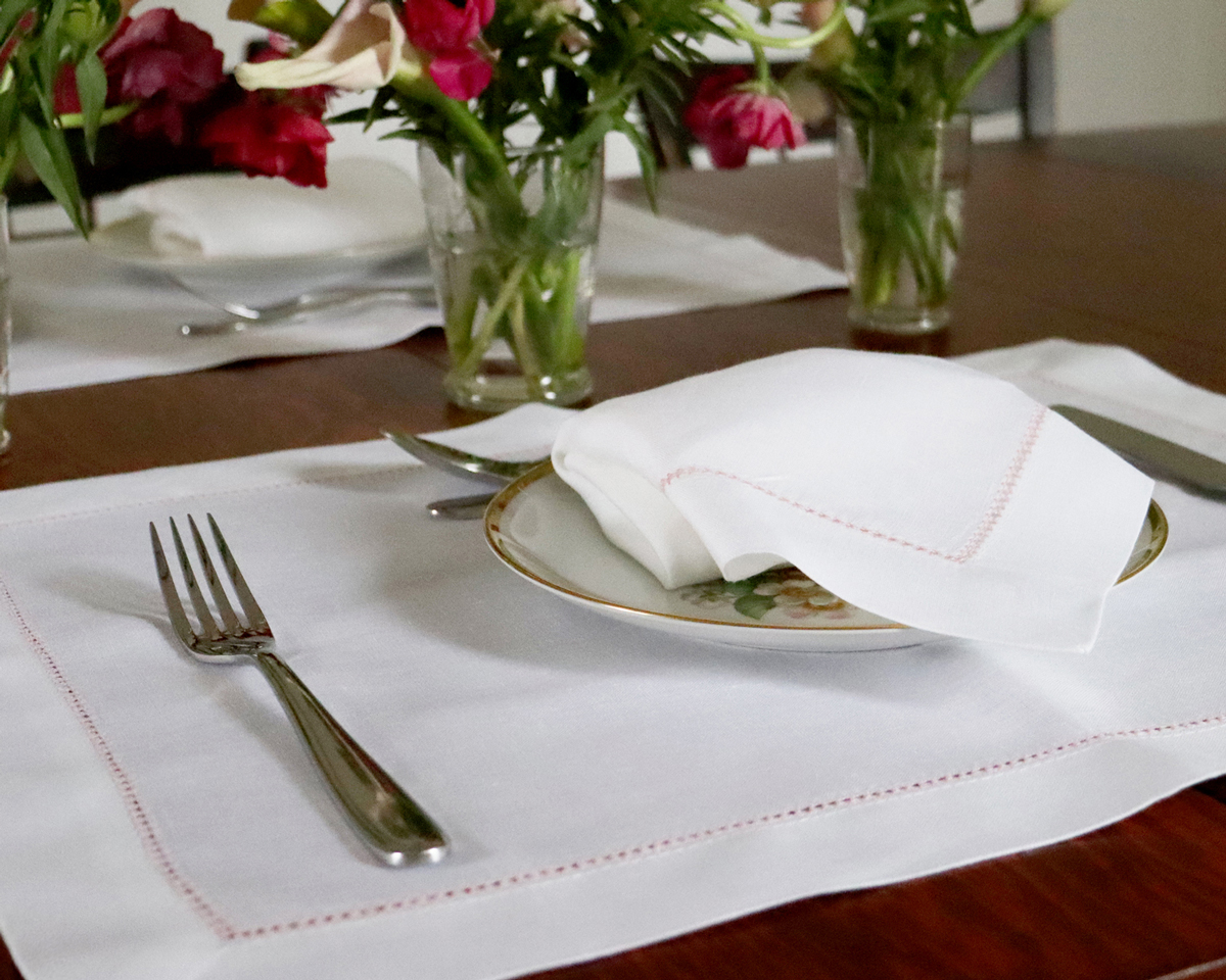 White linen napkin pink trim placemat set 